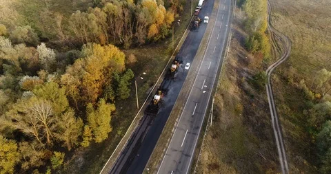 Aerial view: Construction of Highways. Hot Recycling Machines running on the Stockbeeldmateriaal 103307063