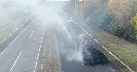 Aerial view: Construction of Highways. Hot Recycling Machines running on the Stockbeeldmateriaal 103307143