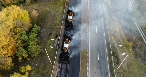 Aerial view: Construction of Highways. Hot Recycling Machines running on the Stockbeeldmateriaal 103307580