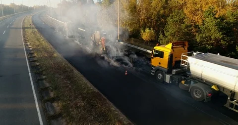 Aerial view: Construction of Highways. Hot Recycling Machines running on the Stockbeeldmateriaal 103307785