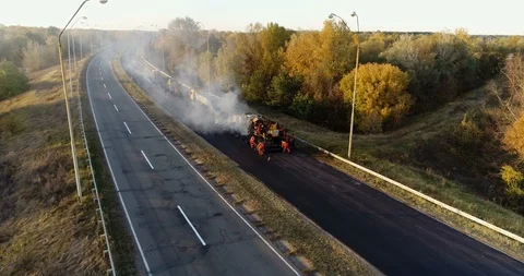 Aerial view: Construction of Highways. Hot Recycling Machines running on the Stockbeeldmateriaal 103307890
