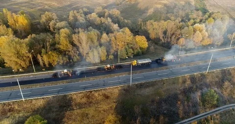 Aerial view: Construction of Highways. Hot Recycling Machines running on the Stockbeeldmateriaal 103307926