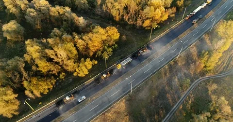 Aerial view: Construction of Highways. Hot Recycling Machines running on the Stockbeeldmateriaal 103308111