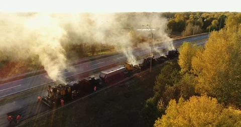 Aerial view: Construction of Highways. Hot Recycling Machines running on the Stockbeeldmateriaal 103308502
