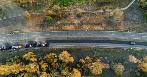 Aerial view: Construction of Highways. Hot Recycling Machines running on the Stockbeeldmateriaal 103308770