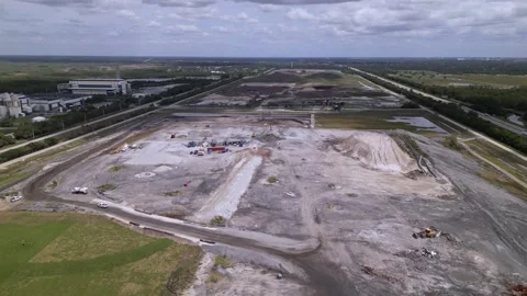 Aerial view of construction. large construction site earthmover machines Stock Footage 241951703