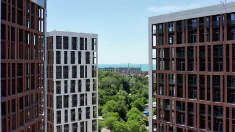 Aerial view. Construction of new multi-storey buildings in a residential area of 動画素材 155042022