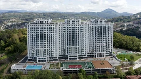 Aerial view. Construction of new multi-storey buildings in a residential area of 動画素材 164192480