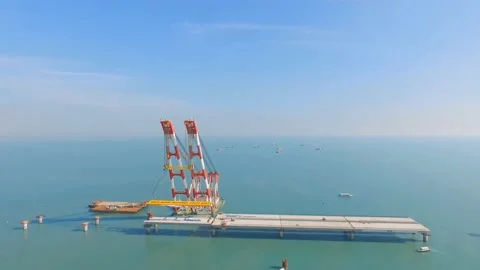 Aerial view of the construction of one of the longest bridges Stock Footage 218642899