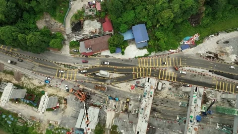 Aerial View of Construction Project Altering Traffic Patterns in Gombak Stock Footage 320752390