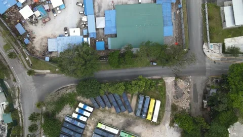 Aerial view of construction site and parking bus in Kuala Lumpur Stock Footage 148497730