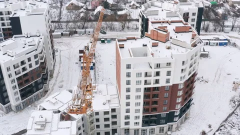 Aerial view of a construction site covered with snow. Stock Footage 147075932