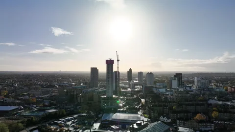 Aerial view of construction site with crane near London skyline Stock Footage 323683054