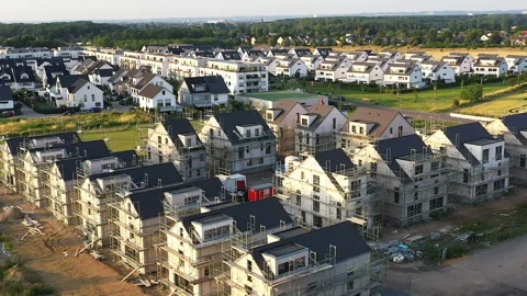 Aerial View of a Construction Site with Detached Houses Under Construction. Video stock 274428967