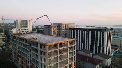 Aerial view of a construction site with a high-rise building under development Stock Footage 300369937