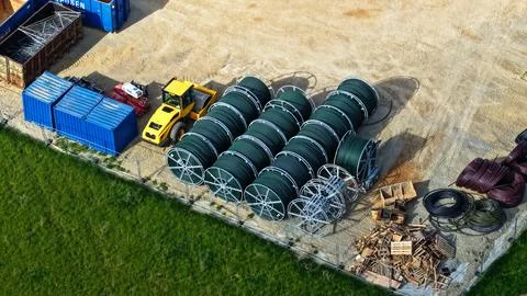 Aerial View of Construction Site with Large Cable Reels, Wheel Loader Фото