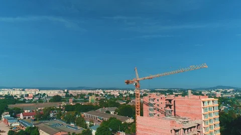 Aerial view of construction site of new residential building with tower crane Video stock 113080197