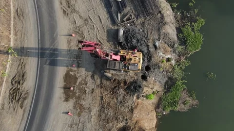 Aerial view of construction site with piling machine, Indonesia. Stock Footage 345063092