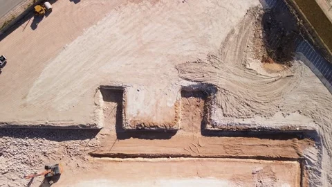 Aerial view of the construction site. A pit dug for the foundation of a building Stock Footage 268870707