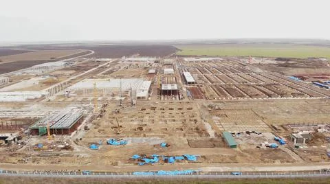 Aerial view on a construction site in progress Industrial zone  Stock Photos