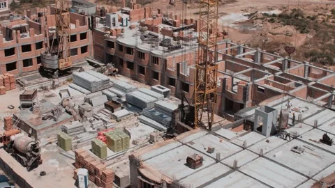Aerial view on a construction site of the red bricks building Video stock 143135718