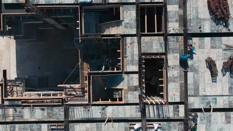 Aerial View: A construction site time-lapse reveals the teamwork of engineers Stock Footage 296080285