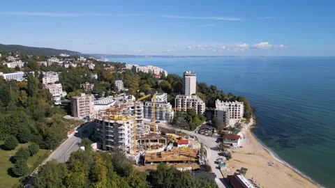 Aerial view of a construction site with tower cranes building modern apartments Stock Footage 319752515