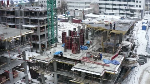 Aerial view of construction site in winter city. Stock Footage 169072604