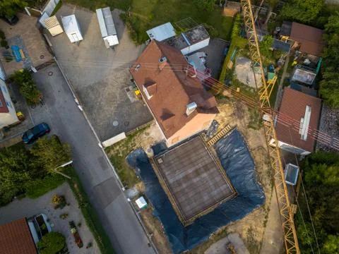 Aerial view of a construction site within a village in Germany. Stock Photos
