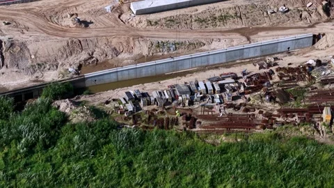 Aerial View of Construction Site with Workers, Machinery and Building Materials Stock Footage 342051476