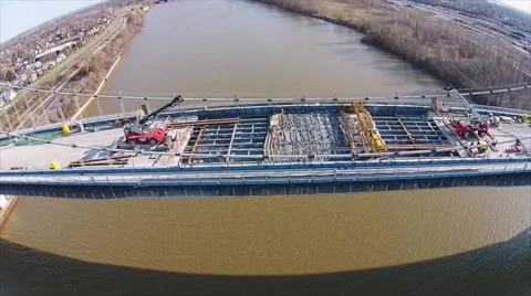 Aerial View of Construction on Suspension Bridge Stock Footage 40340512