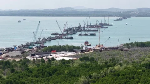 Aerial view of the construction of a very long bridge Stock Footage 344860963