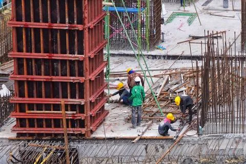 Aerial view of construction worker working. Stock Photos