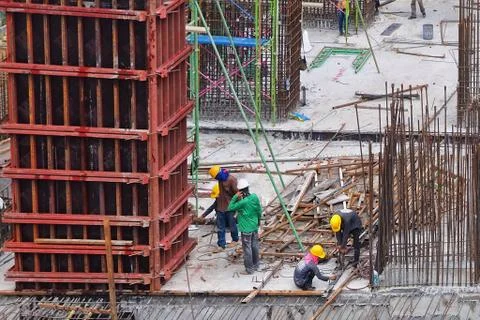 Aerial view of construction worker working. 库存照片