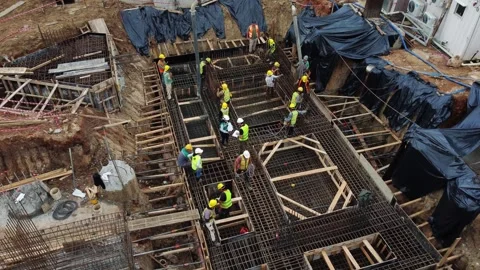 Aerial view construction workers building foundation Asuncion Paraguay Vidéo 333718824