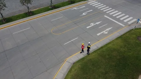 Aerial view of construction workers walking on a pavement Stock Footage 337788774