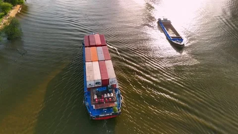 Aerial view of container cargo ship sailing on a river in vietnam for impor.. 스톡 동영상 335012878