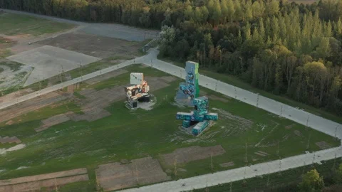 Aerial view from container in open field near woods trees Stock Footage 122524425