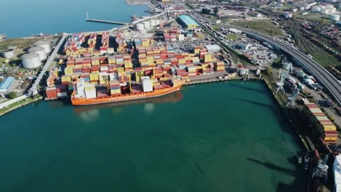 Aerial view of container port, container ship, oil pier Stock Footage 232476260