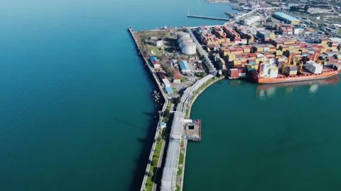 Aerial view of container port, container ship, oil pier Stock Footage 232476356