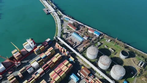 Aerial view of container port, container ship, oil pier Stock Footage 232478376