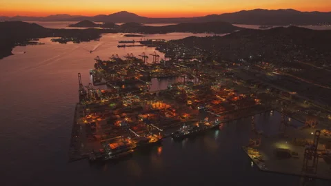 Aerial view of container port logistics at sunset Stock Footage 346377216