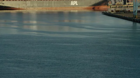 Aerial view of container ship and dock cranes Los Angeles Port USA Stock Footage 64779026