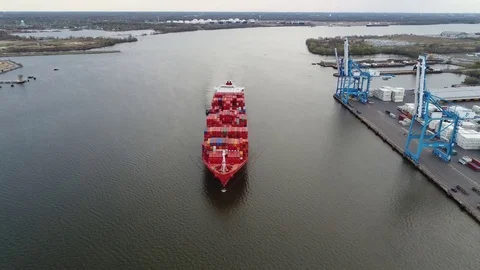 Aerial View of Container Ship and Tugboat Arriving Port of Philadelphia Stock Footage 74513990