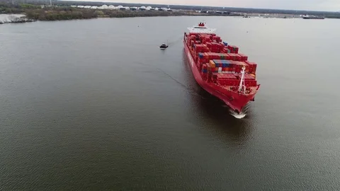 Aerial View of Container Ship and Tugboat Arriving Port of Philadelphia Stock Footage 74513997