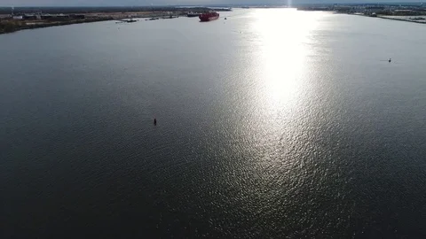 Aerial View of Container Ship and Tugboat Arriving Port of Philadelphia Stock Footage 74514049
