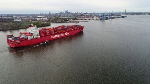 Aerial View of Container Ship and Tugboat Arriving Port of Philadelphia Stock Footage 74514174