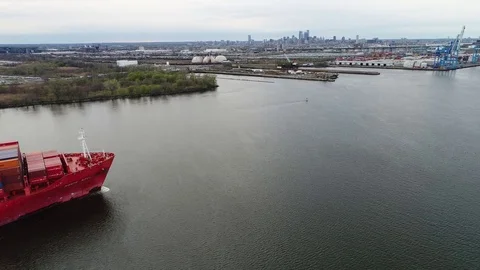 Aerial View of Container Ship and Tugboat Arriving Port of Philadelphia Stock Footage 74514193