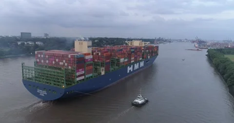 Aerial view of container ship arriving at Hamburg port on river Elbe in Germany Stock Footage 158762436