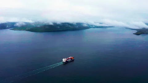 Aerial view of a container ship in the atlantic ocean. Faroe islands. Stock Footage 168446422